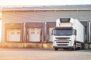 A refrigerated truck at a distribution center.