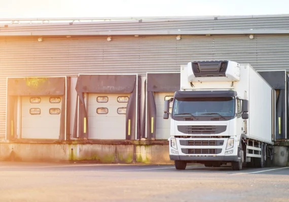 A refrigerated truck at a distribution center.