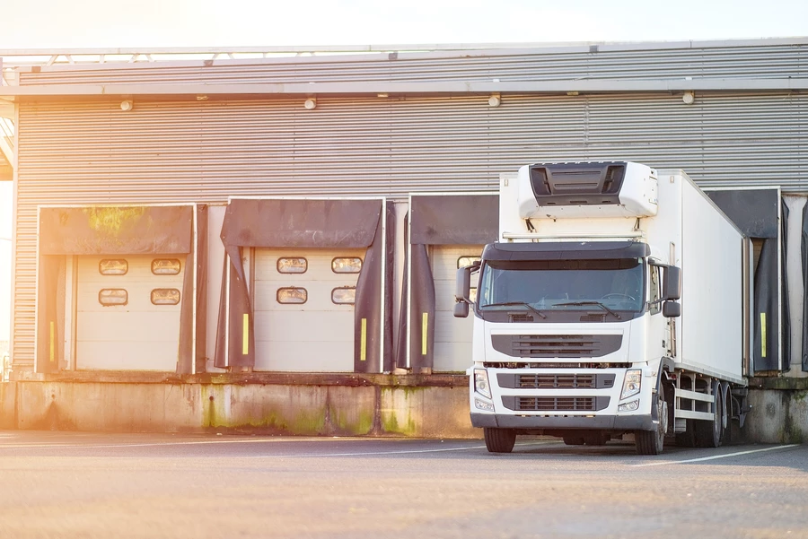 A refrigerated truck at a distribution center.