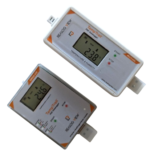 Two white temperature and humidity data loggers with a display screen for accurate monitoring and cold chain integrity.