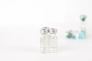 Vials containing (or that once contained) a vaccine.