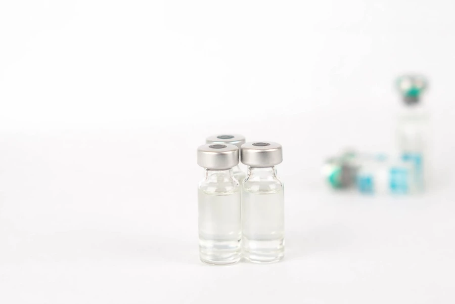 Vials containing (or that once contained) a vaccine.
